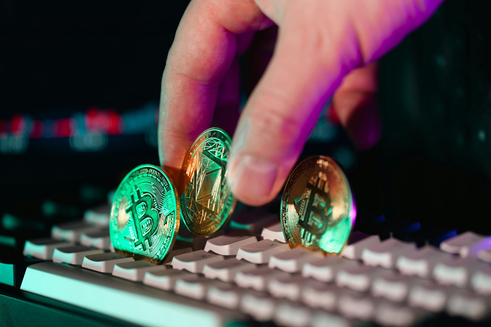 A person is typing on a computer keyboard
